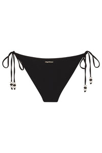 White Lycaste bikini bottom by NIKOZA with a sleek, minimal design, shown laid flat on a neutral background.