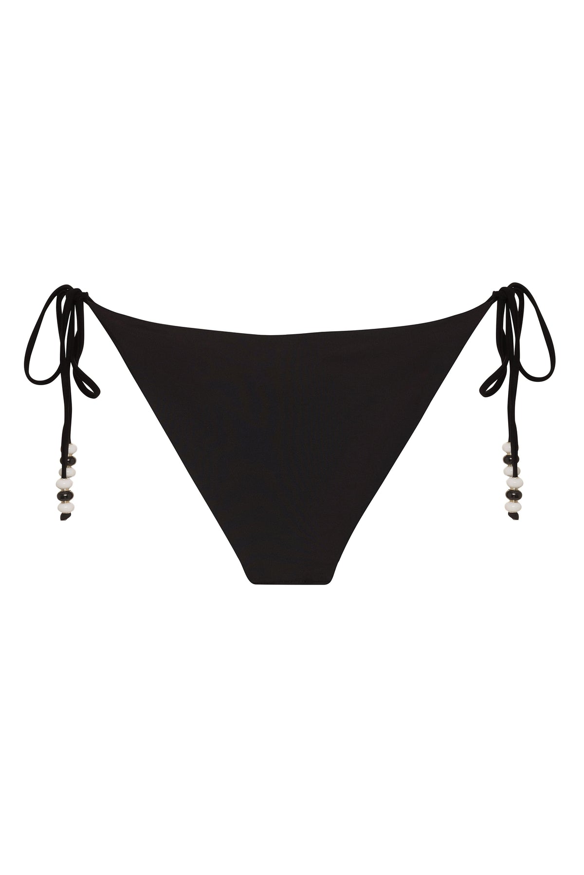 Reversible fuchsia and black Cattleya bikini bottom by NIKOZA with tie sides, shown on a model.