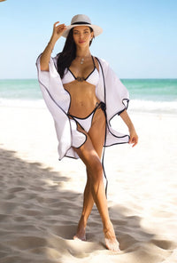 NIKOZA Brickell Chic bikini top in vibrant fabric with adjustable straps, showcasing a stylish swimwear design.
