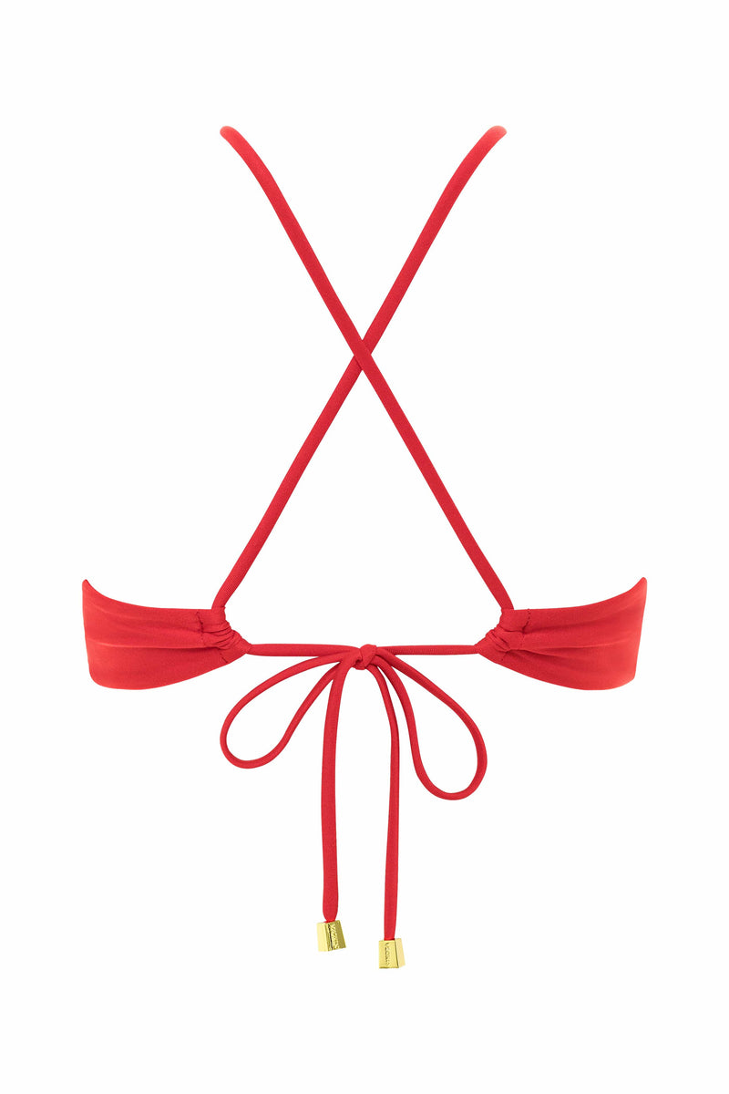 NIKOZA Camila red bikini top with adjustable straps and triangle design, shown on a model in a beach setting.