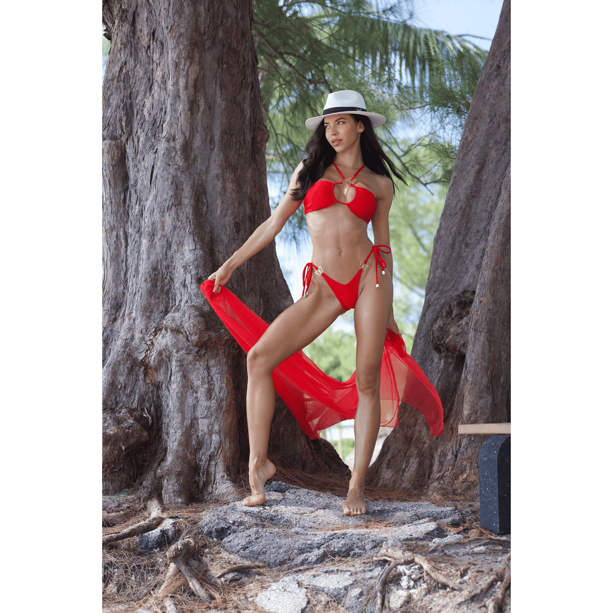 NIKOZA Camila red bikini top, XS size, featuring a stylish design with adjustable straps and vibrant red color.