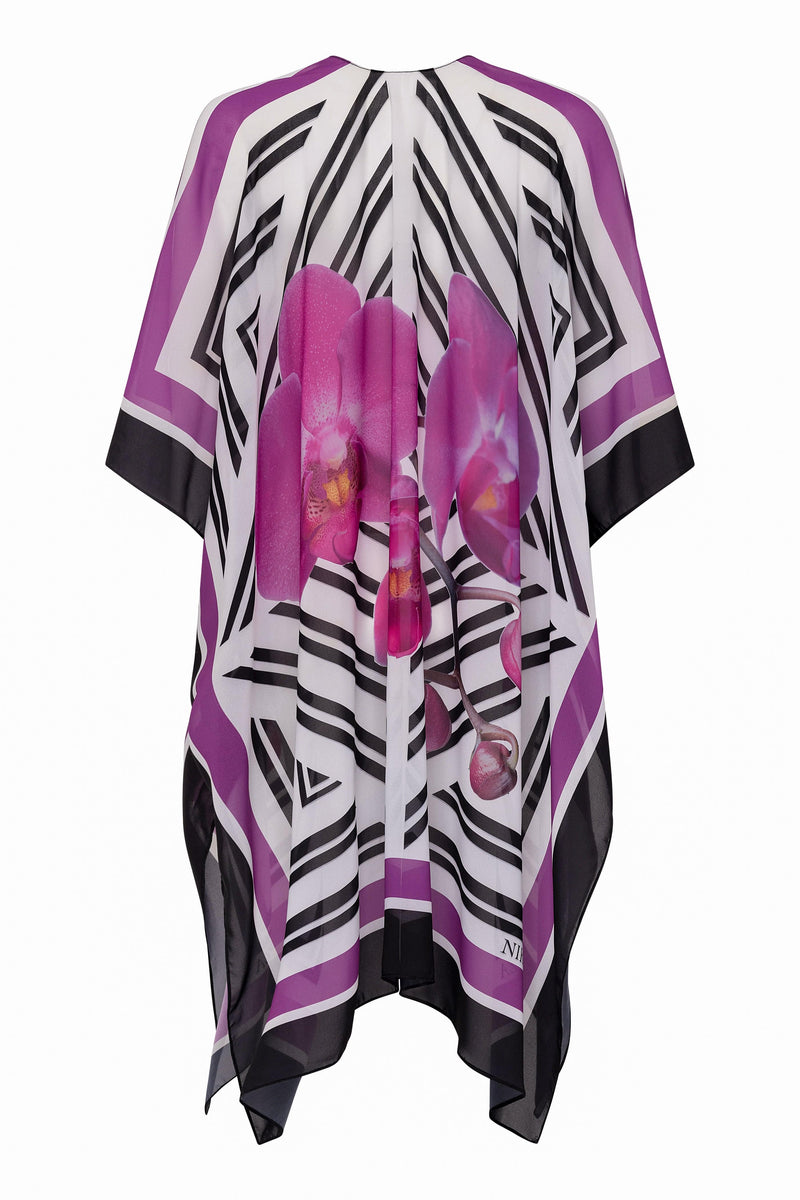 White Phalaenopsis silk cover-up tunic by NIKOZA featuring a flowing, lightweight design for elegant beachwear.
