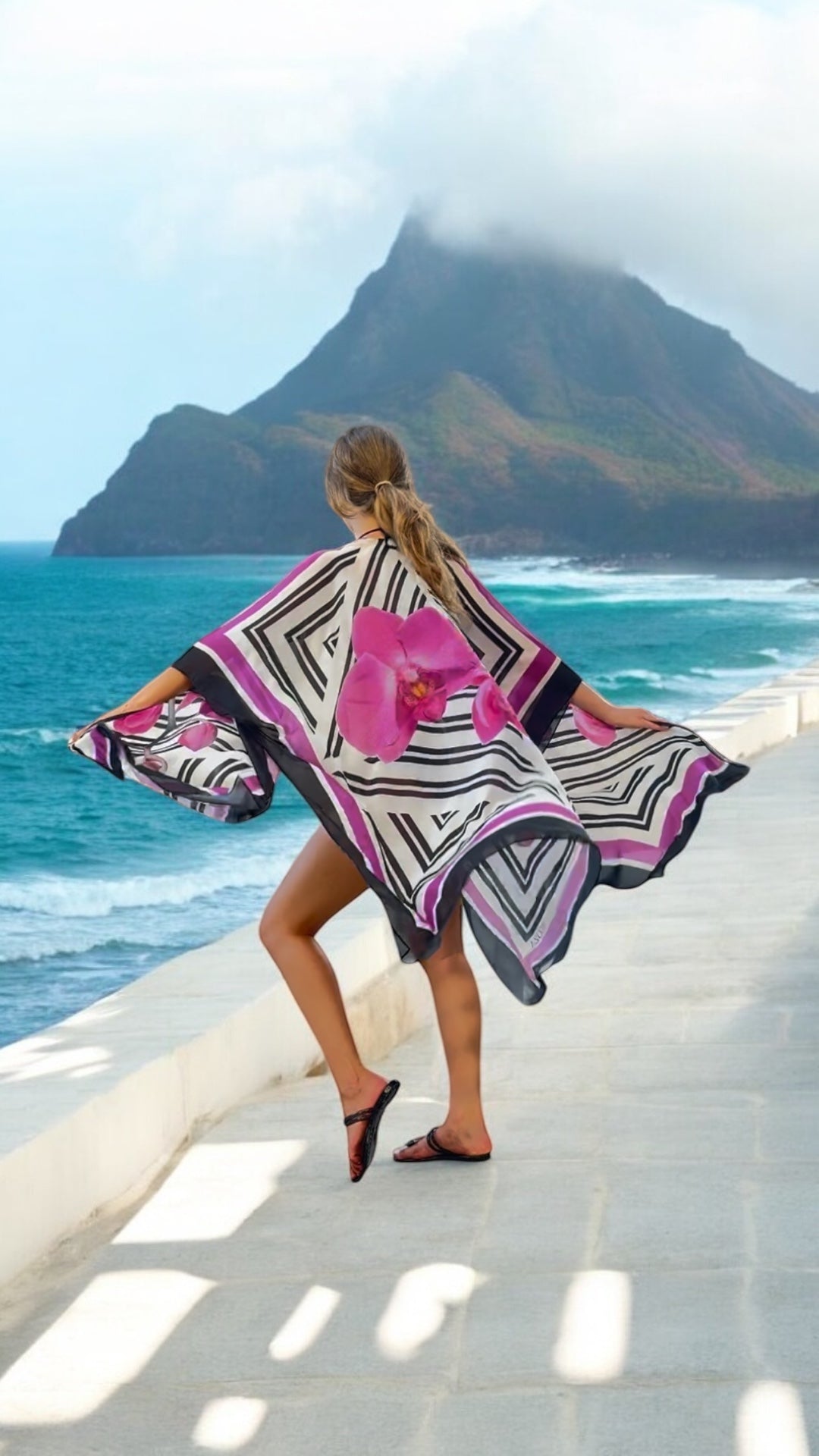 NIKOZA Phalaenopsis silk cover-up tunic featuring a flowing, elegant design in soft silk fabric, ideal for stylish layering.