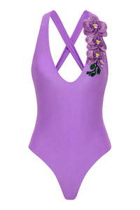 NIKOZA Goddess in Lilac one-piece swimsuit featuring a fitted, stylish lilac swimwear design on a model.