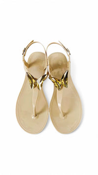 NIKOZA ALIANA clear gel beach sandals with transparent straps and flat sole, ideal for casual summer wear.