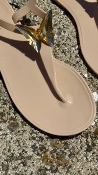 NIKOZA ALIANA clear gel beach sandals with transparent straps and cushioned soles, designed for comfortable summer footwear.