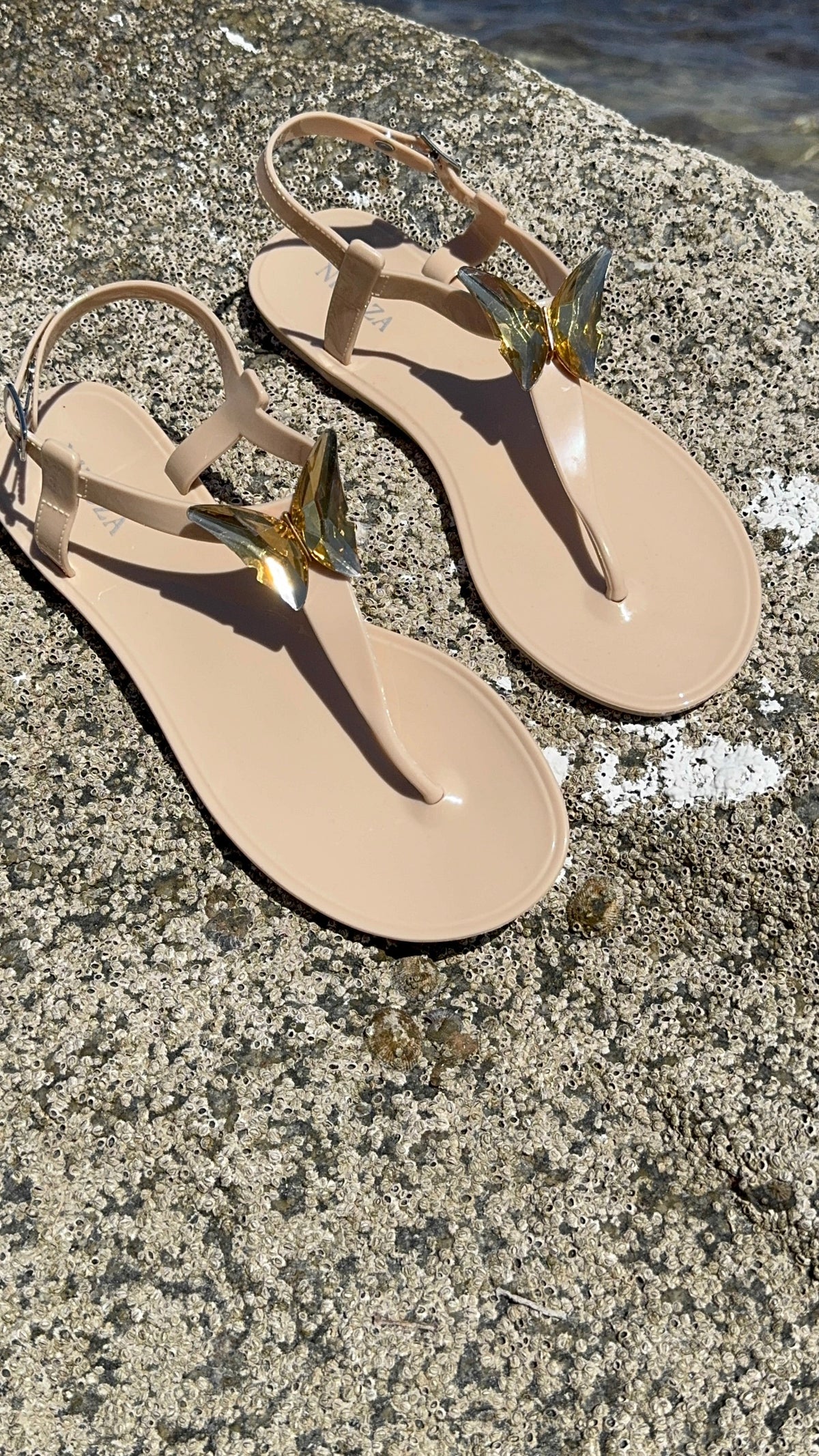 NIKOZA ALIANA clear gel beach sandals with open toe design and transparent straps for comfortable summer footwear