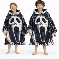 Ghost Face horror blanket hoodie by Olm Collectibles, featuring a spooky ghost face design, worn as a cozy wearable blanket for kids and adults.