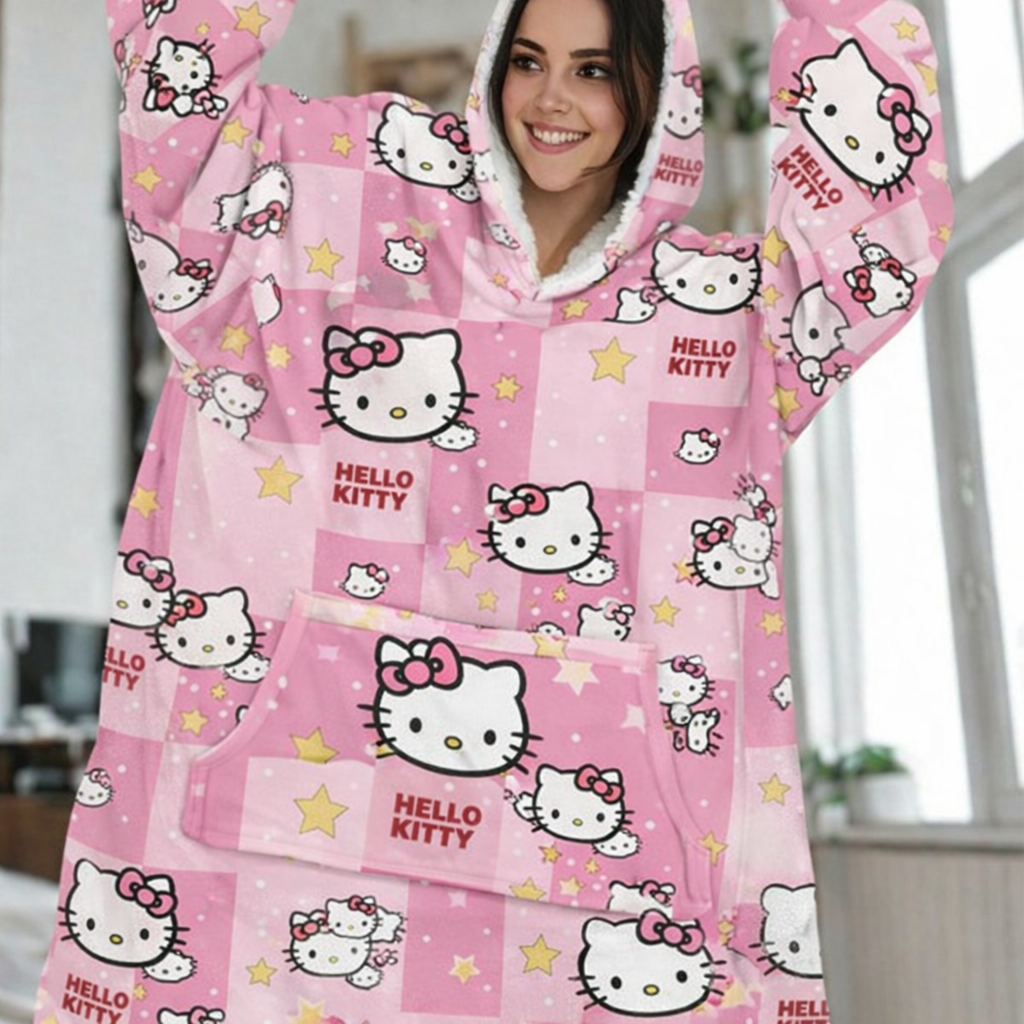 Olm Collectibles Hello Kitty wearable blanket hoodie for kids and adults, soft, cozy, with Hello Kitty design on the blanket hoodie.