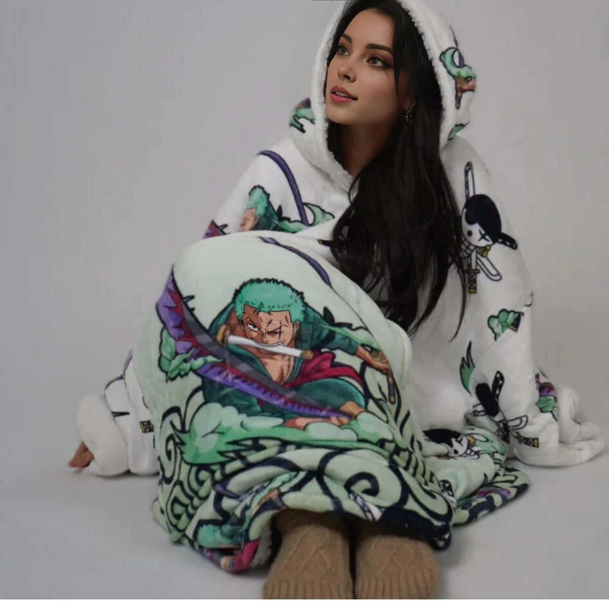 Olm Collectibles Zoro One Piece wearable blanket hoodie for kids and adults, featuring a comfortable, cozy design with Zoro artwork.