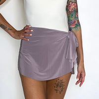 Light purple ballet wrap skirt by oodelooo Ballet Wear, featuring a lavender mist demi skirt for elegant dance attire.