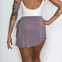 Light purple ballet wrap skirt by oodelooo Ballet Wear, lavender mist demi skirt with pull-on design and elegant wrap style.
