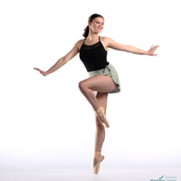 Light green Pistachio ballet wrap skirt by oodelooo Ballet Wear, demi-length with a soft, flowing silhouette for dance or casual wear.
