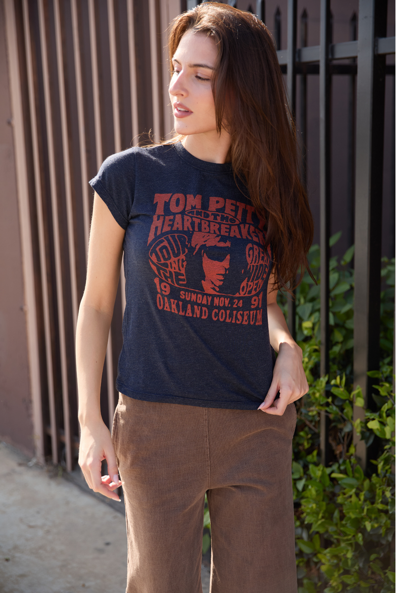 People of Leisure Tom Petty Oakland Coliseum T-shirt featuring a vintage concert graphic on a casual top.