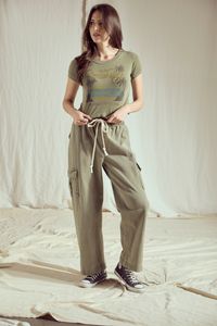 People of Leisure California Dreamin' Baby Tee top featuring a vintage-inspired graphic design, casual fit, and soft fabric.