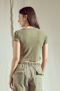 People of Leisure California Dreamin' Baby Tee top featuring vintage-inspired beach and sunset graphic design.