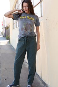 Heather Women’s Willie Nelson On The Road tee top by People of Leisure, featuring a relaxed fit with Willie Nelson graphic print.