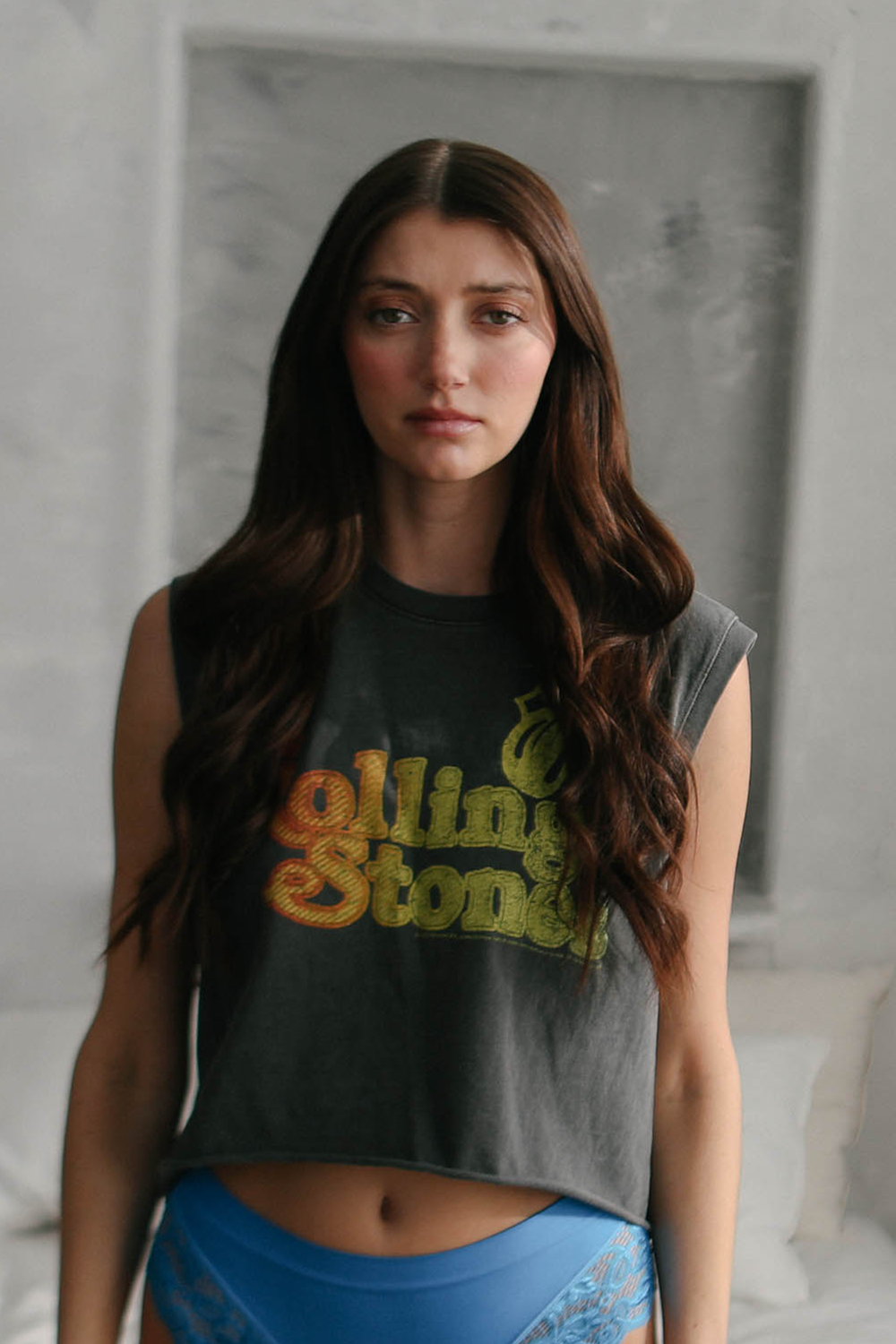 Women’s Rolling Stones Hot Stuff graphic tank top by People of Leisure, featuring bold band logo design.