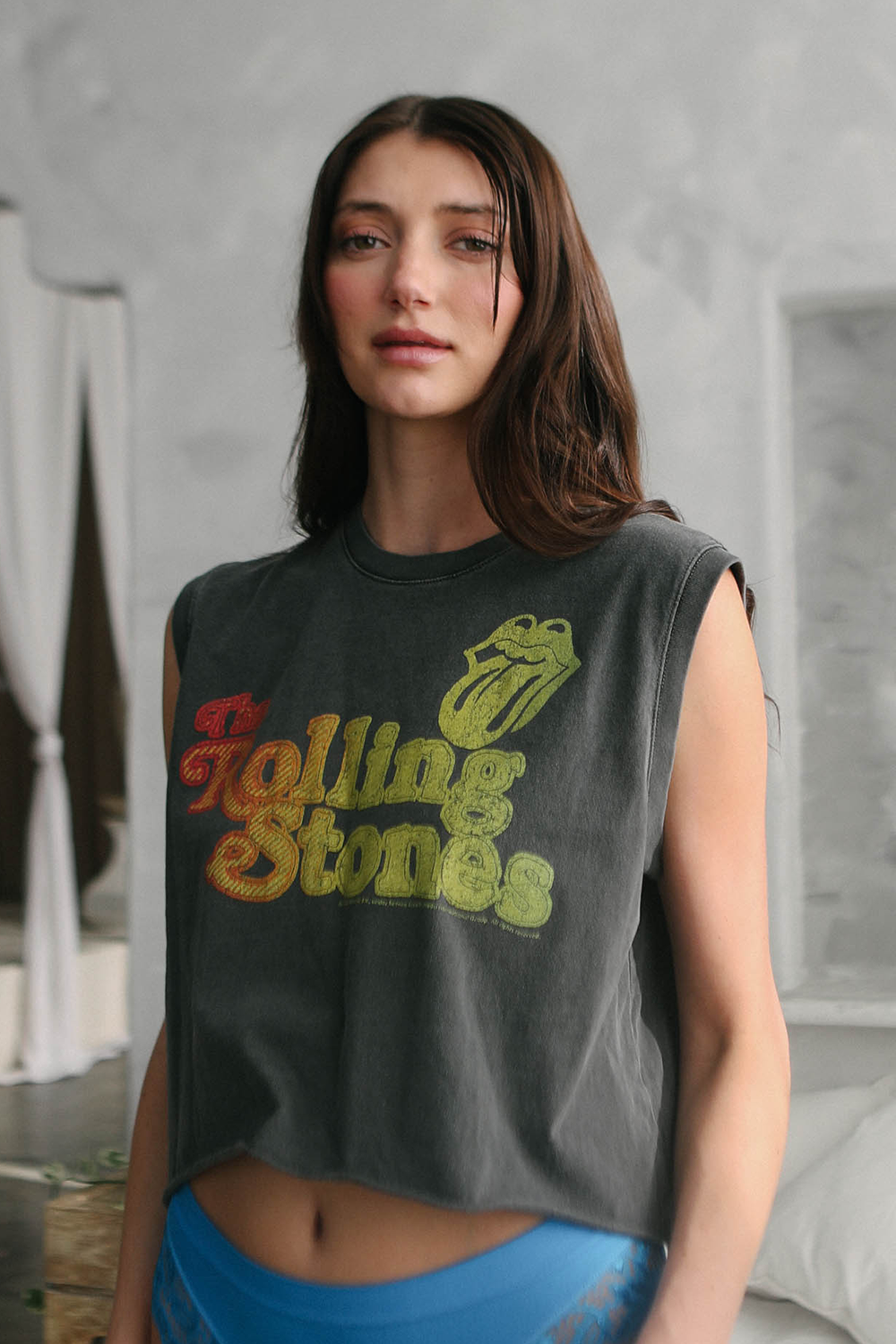 People of Leisure Rolling Stones Hot Stuff women’s graphic tank top featuring colorful Hot Stuff design on soft fabric.