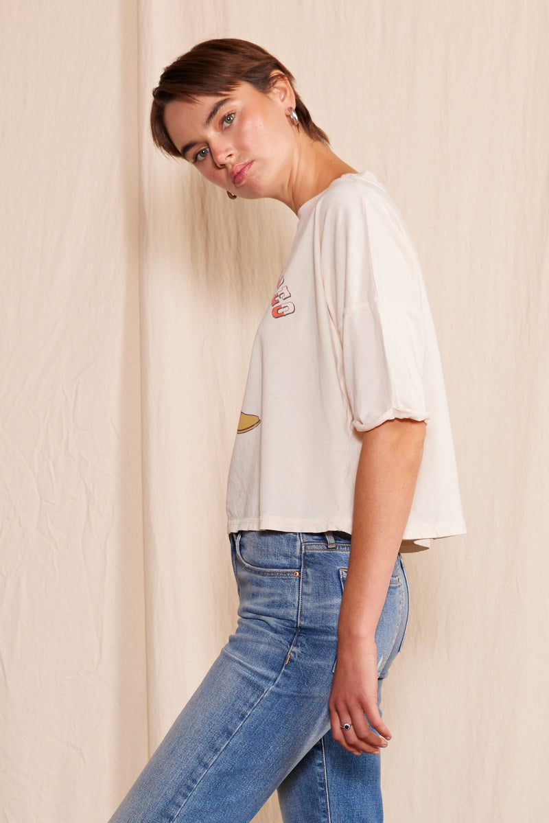 People of Leisure "Not My First Rodeo" graphic crew neck T-shirt, casual cotton tee with bold printed text on front.