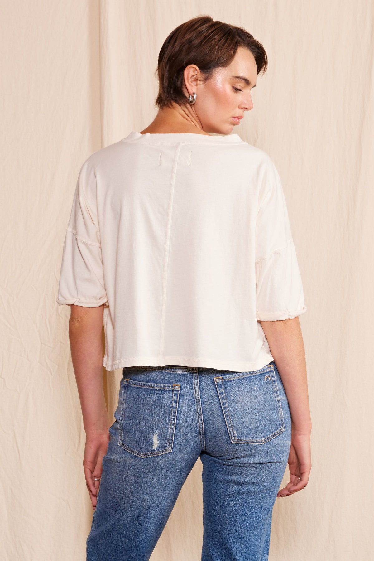 People of Leisure "Not My First Rodeo" graphic crew neck T-shirt featuring bold text design on a casual cotton tee.