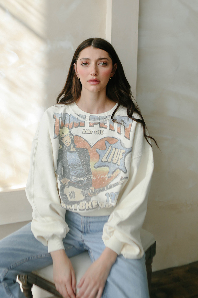 Women’s Tom Petty and the Heartbreakers 1979 sweatshirt by People of Leisure, featuring vintage-inspired graphic print.