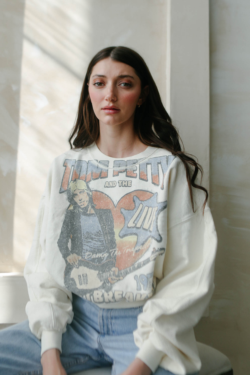 Women's Tom Petty and the Heartbreakers 1979 sweatshirt by People of Leisure, featuring vintage-inspired band graphic design.