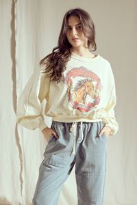 Willie Nelson Wild West women’s sweatshirt by People of Leisure featuring a western-themed design on soft fabric.