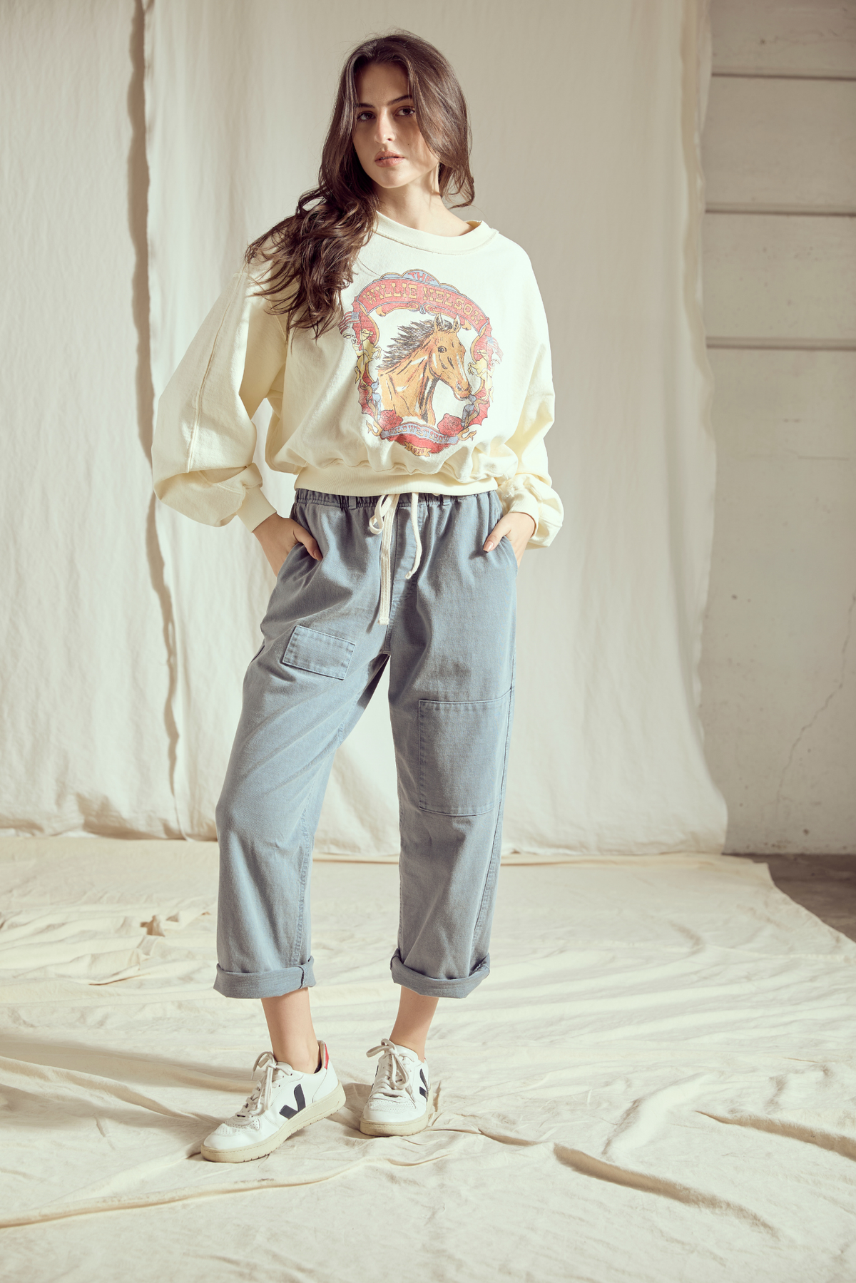 Willie Nelson Wild West Women sweatshirt by People of Leisure showing a graphic print with Western cowboy theme.