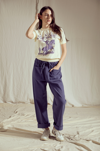Women’s Stay Wild Raglan Summer Top by People of Leisure, casual short-sleeve women’s top with graphic design and relaxed fit.