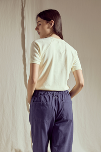 Women’s Stay Wild raglan summer top by People of Leisure, casual short-sleeve shirt with a relaxed fit and graphic design.