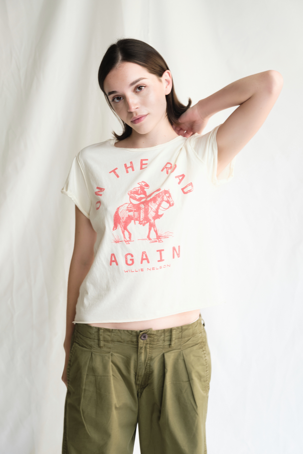Women’s “On The Road Again” tee top by People of Leisure, casual white t-shirt with printed design, front view.