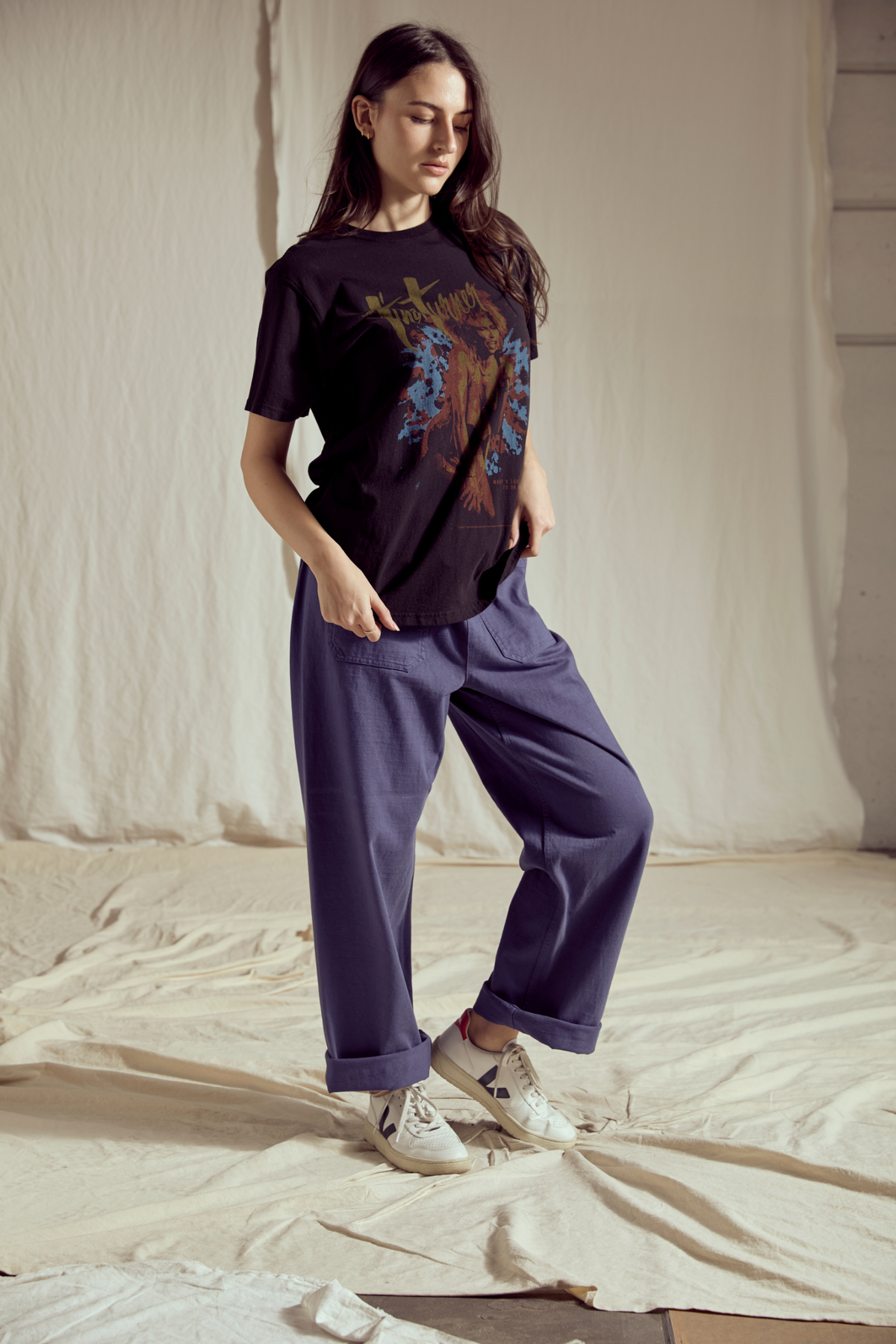 Women's white "What's Love" graphic tee by People of Leisure, featuring a casual fit and soft cotton fabric.