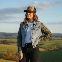 Burned quilted sleeve denim jacket for women by Piper Hat Co, featuring stylish distressed details and a trendy fit.