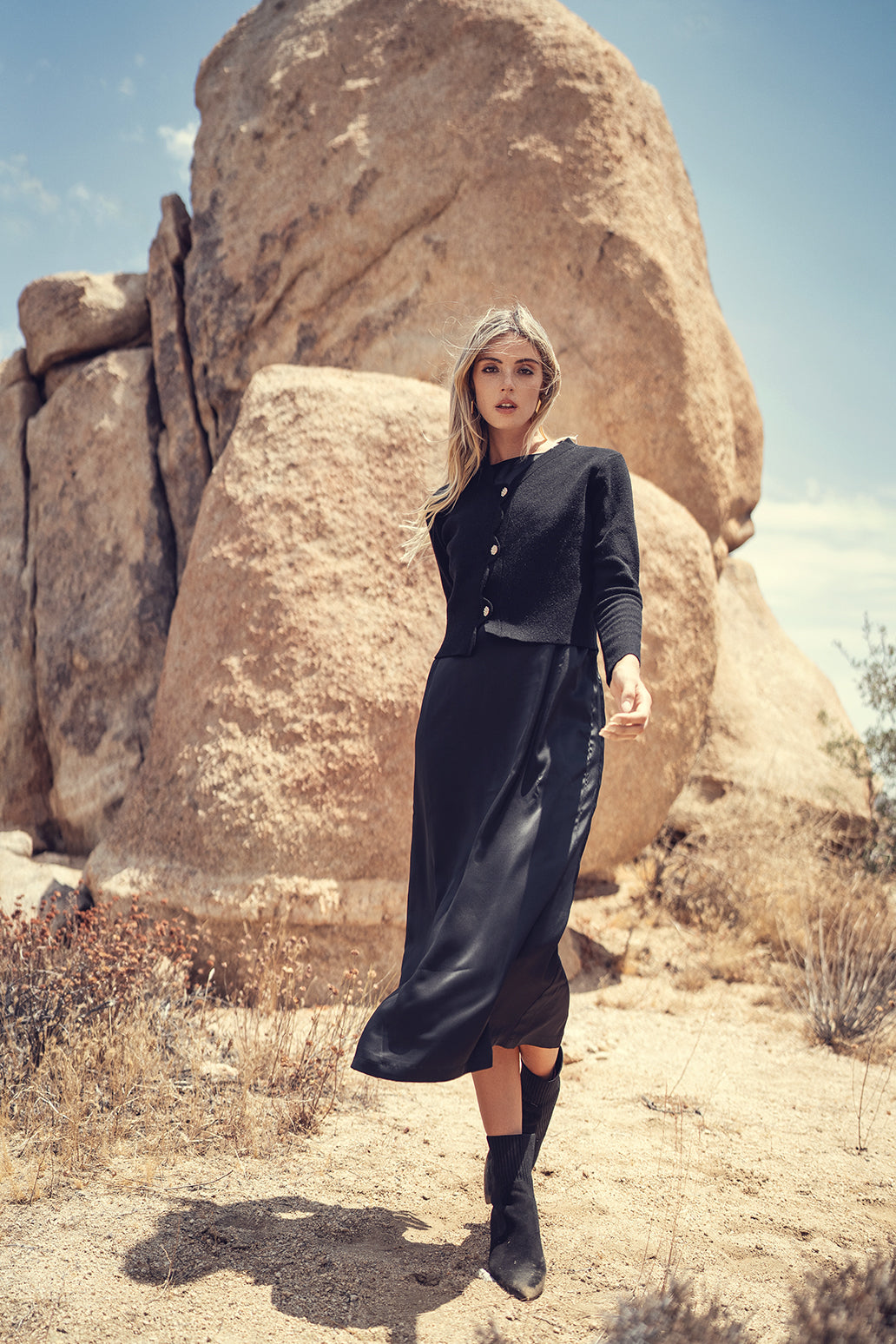 Profile NYC slip dress shown on a hanger, lightweight fabric with a sleek, minimalist design and subtle detailing.