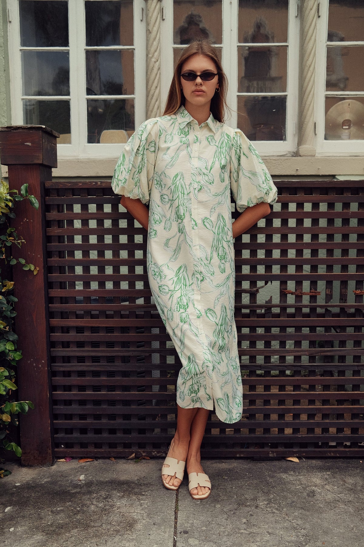 Floral linen dress by profile-nyc featuring a flowy silhouette, vibrant floral pattern, and lightweight fabric perfect for warm weather.