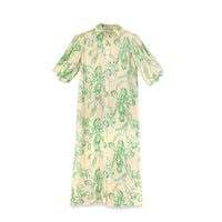 Floral linen dress by Profile NYC featuring a flowy design with a vibrant floral pattern and lightweight fabric.