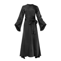 Profile NYC bell sleeve dress logo on fabric featuring stylish bell sleeves and a classic silhouette.