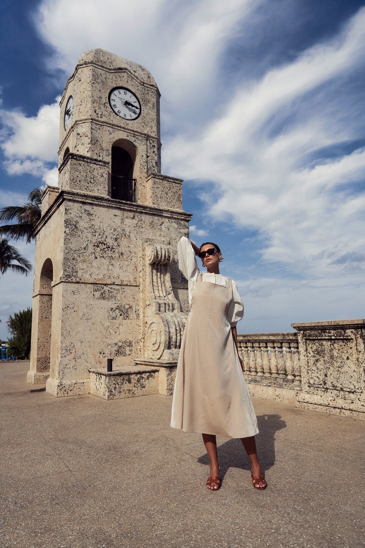 Elegant silk jumper dress by Profile NYC, featuring a smooth, flowing fabric and a stylish, modern design.