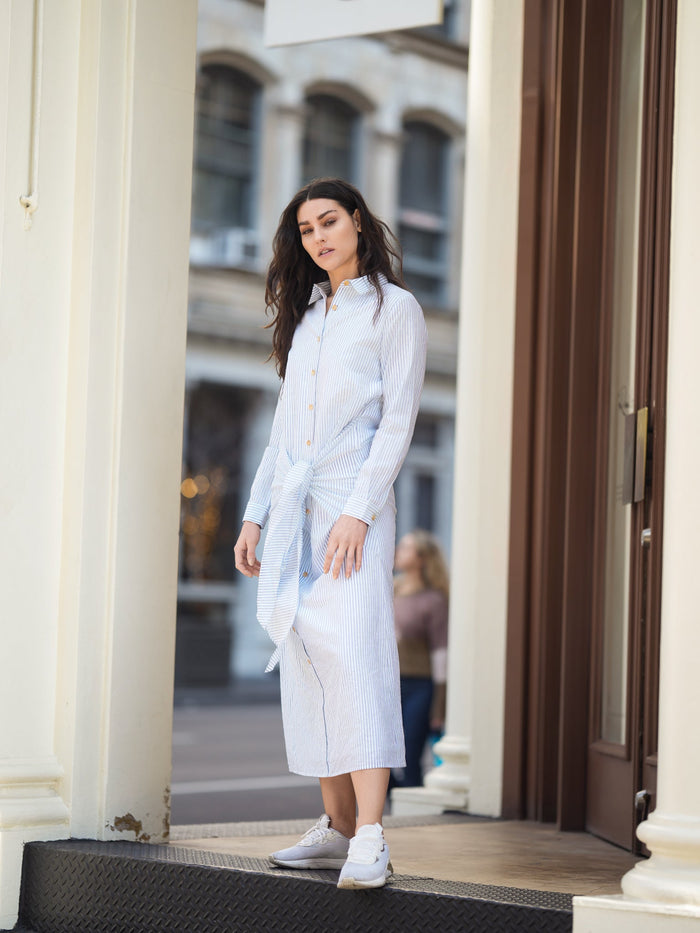Striped front tie dress from Profile NYC featuring a stylish design and lightweight fabric, perfect for casual or summer wear.
