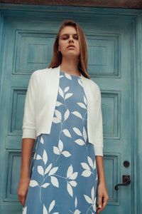 Blue and white floral jumper dress by Profile NYC, featuring a stylish, comfortable design with a vibrant floral pattern.