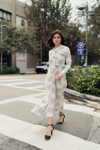 Cream print Yulia shirred dress by Profile NYC, featuring a comfortable fit and stylish design, shown on a model.