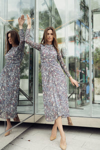 Cream printed Yulia shirred dress by Profile NYC, featuring a fitted bodice and flowing skirt for a stylish, feminine look.