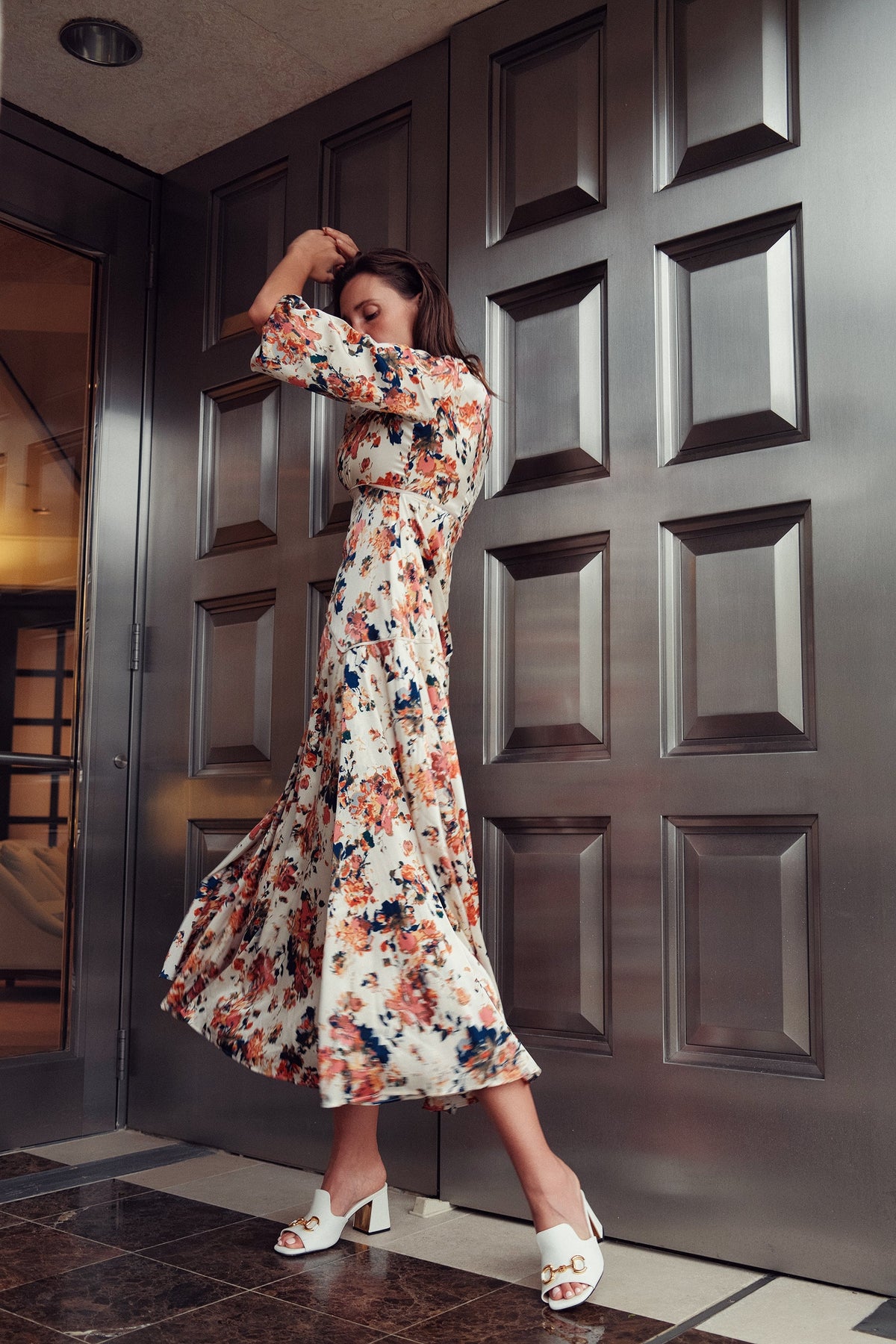 Floral piping dress by profile-nyc featuring a fitted bodice, vibrant floral pattern, and flowing skirt, perfect for spring wear.