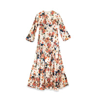 Floral piping dress by profile-nyc featuring a fitted silhouette with vibrant floral patterns and elegant design details.