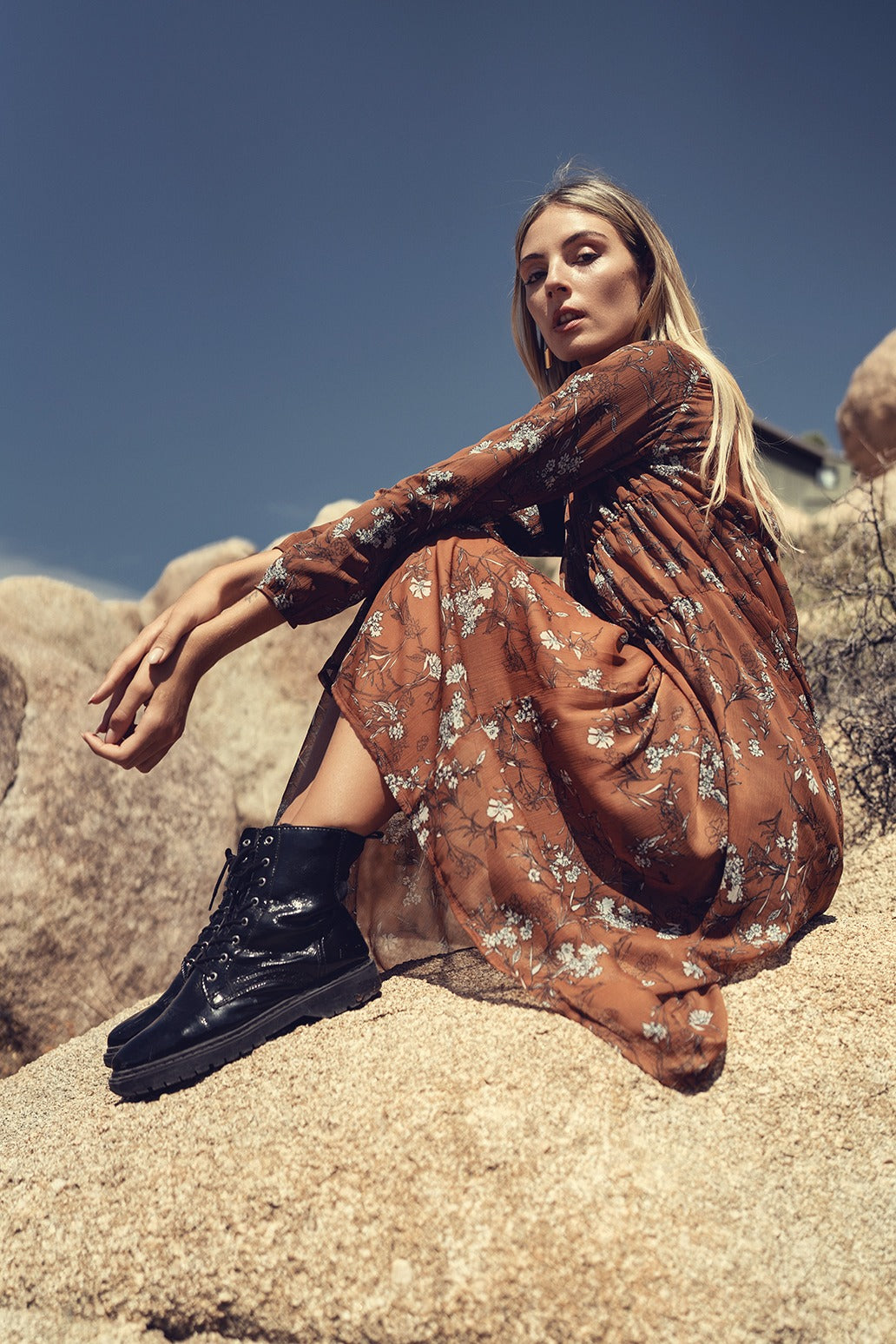 Floral rust dress by Profile NYC, showcasing a stylish dress with a floral pattern and rust color, perfect for casual wear.