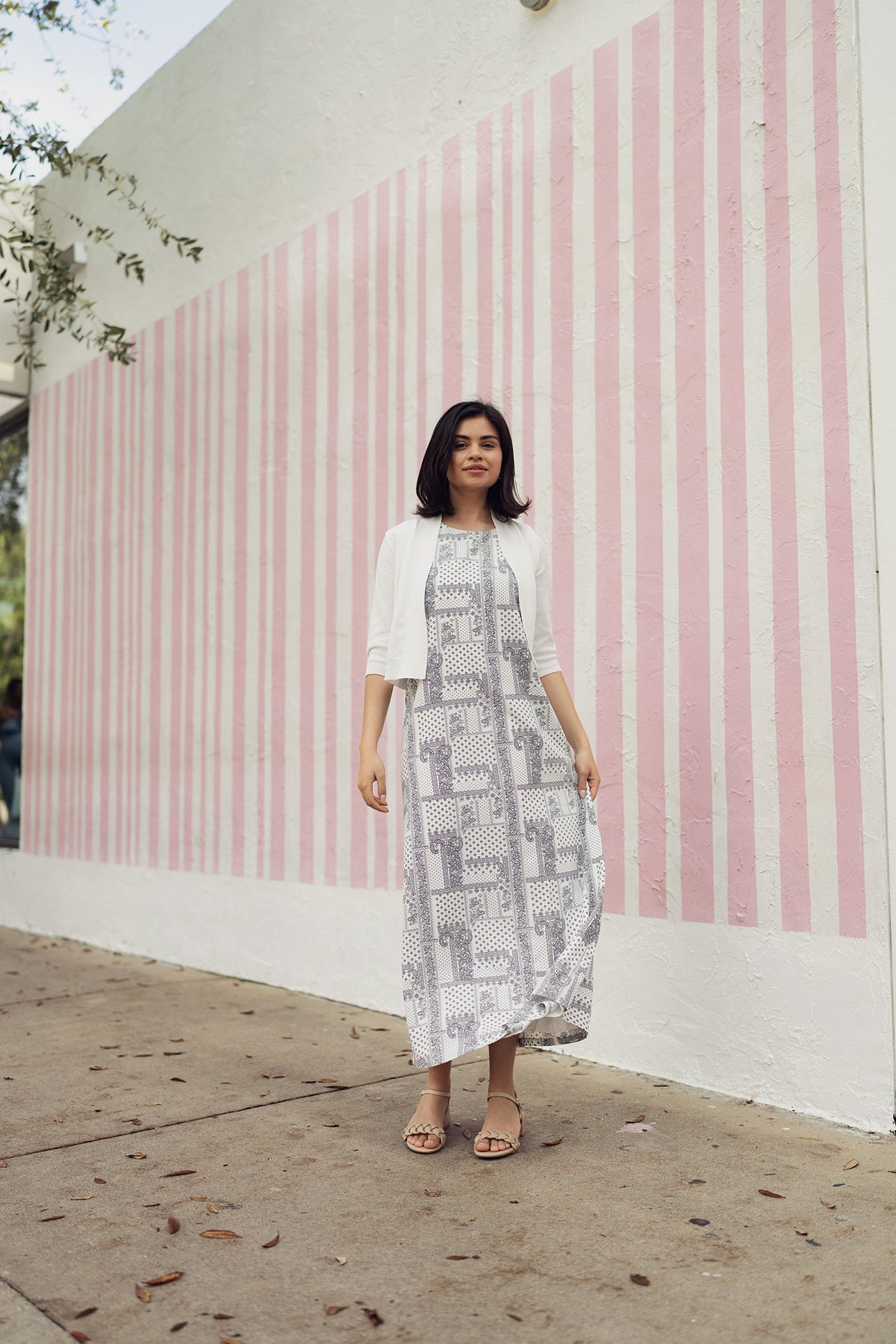 Navy paisley jumper dress by profile-nyc featuring a stylish, patterned fabric and a comfortable, casual fit.