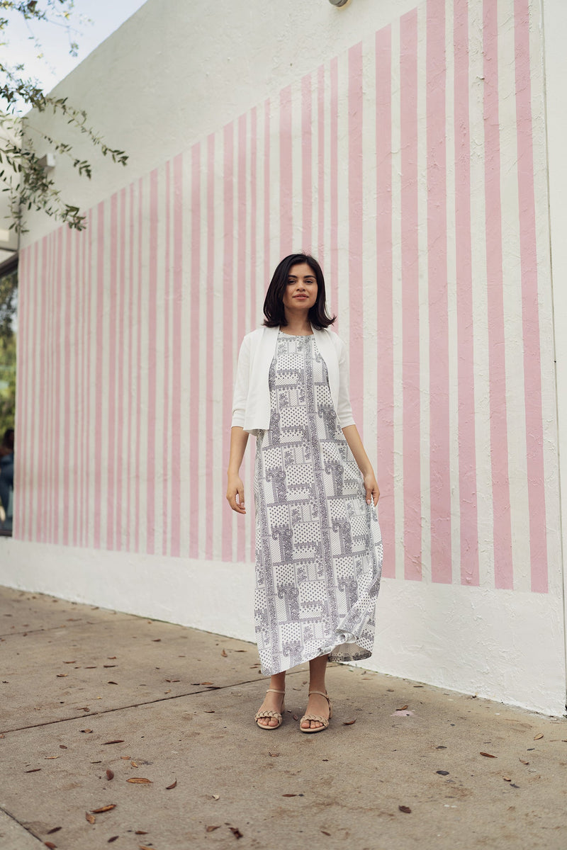 Navy paisley jumper dress by profile-nyc featuring a stylish, patterned fabric and a comfortable, casual fit.