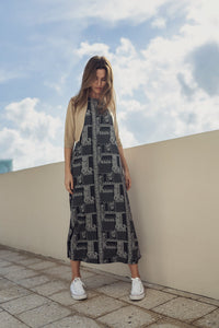 Navy paisley jumper dress by profile-nyc, featuring a stylish pattern and comfortable fit, displayed on a mannequin.