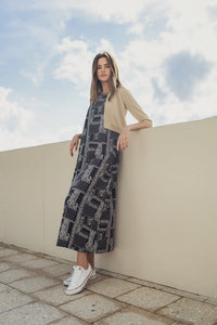 Navy paisley jumper dress by profile-nyc, featuring a stylish, patterned design and comfortable fit, shown on a model.